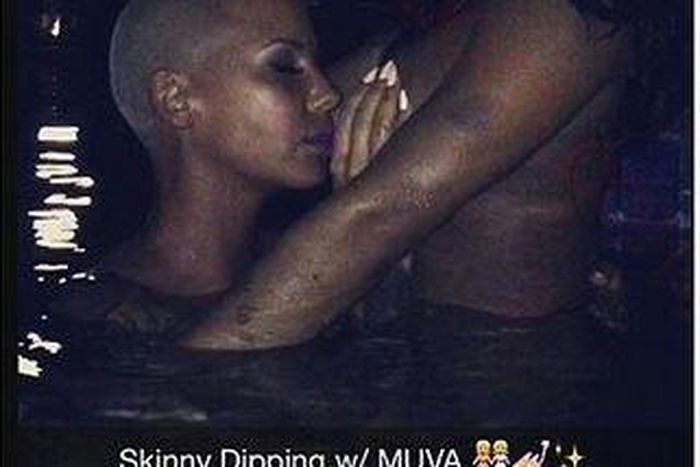 Amber Rose kisses Lira Galore's breasts