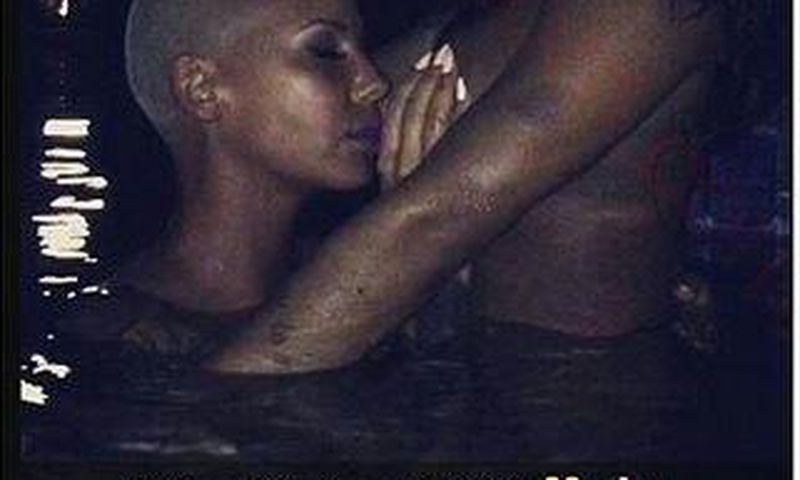 Amber Rose kisses Lira Galore's breasts