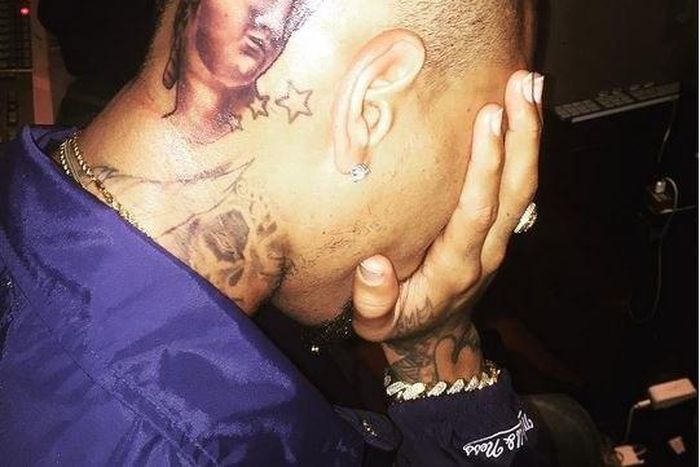 Chris Browns flaunts new head tattoo