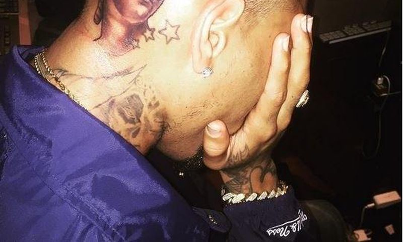 Chris Browns flaunts new head tattoo
