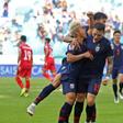 Thailand's Chanathip Songkrasin (left) celebrates his goal agaisnt Bahrain