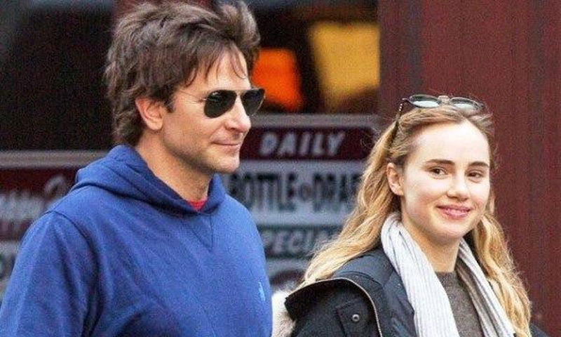 Bradley Cooper and Suki Waterhouse taking a stroll