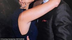 Kourtney Kardashian kisses Scott Disick