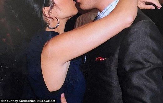 Kourtney Kardashian kisses Scott Disick