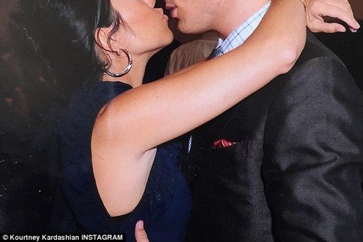 Kourtney Kardashian kisses Scott Disick