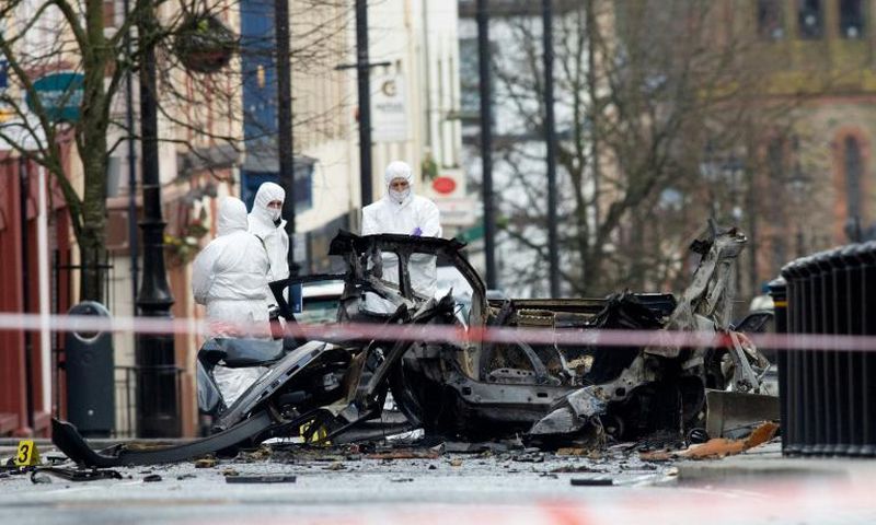 Two men in their twenties were arrested as police and army explosives teams remained at the scene of the blast