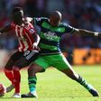 Sadio Mane battles with Andre Ayew
