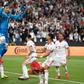 Iran goalkeeper Alireza Beiranvand celebrates after saving an Oman penalty