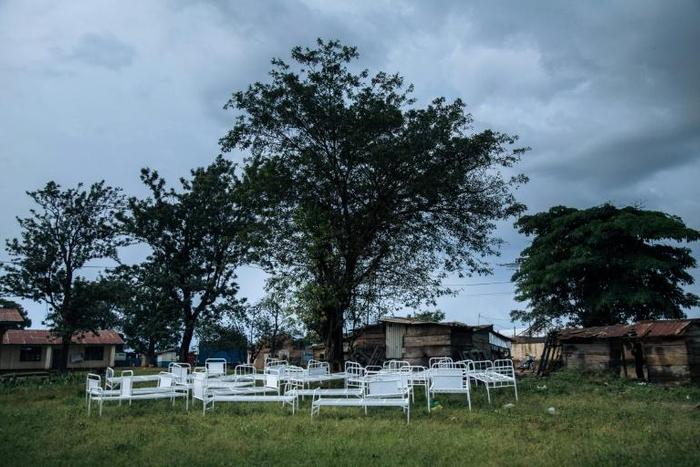Hospital beds at the Ebola transit centre in Beni were stored outside in December, after anti-government protestors ransacked the tents.