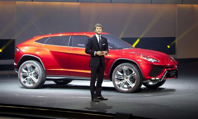 Lamborghni CEO Stefan Winkelmann with the Urus concept car