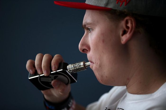 A man using an e-cigarette.