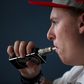 A man using an e-cigarette.