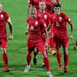 Kyrghyzstan forward Vitalij Lux in his No19 shirt after scoring the opener