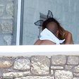 Nicole Scherzinger and Pajtim Kasami kissing in Greece