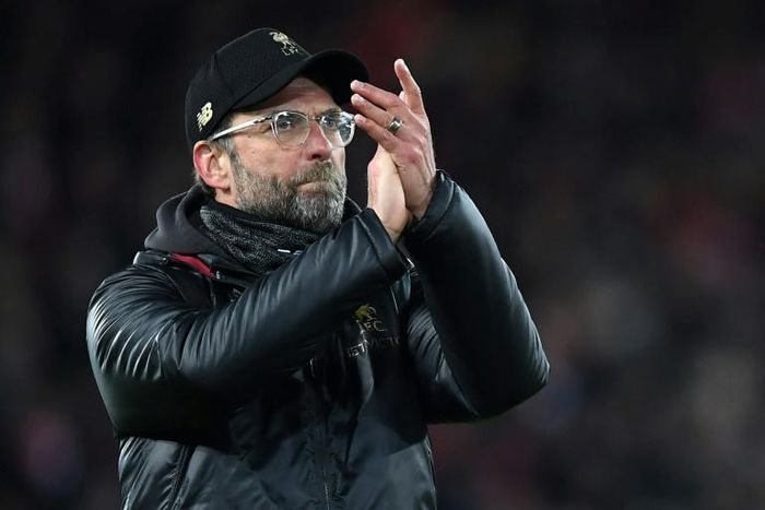 Keep the faith: Liverpool manager Jurgen Klopp applauds supporters following the Premier League leaders 1-1 draw with Leicester at Anfield