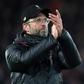 Keep the faith: Liverpool manager Jurgen Klopp applauds supporters following the Premier League leaders 1-1 draw with Leicester at Anfield