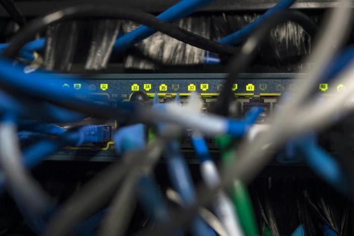 Suspects in Ukraine and Russia were charged in a scheme to hack a US government website to gain early access to sensitive corporate information to beat the market
