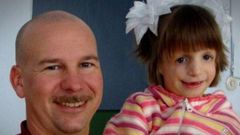 Thom Wetmore and one of his daughters