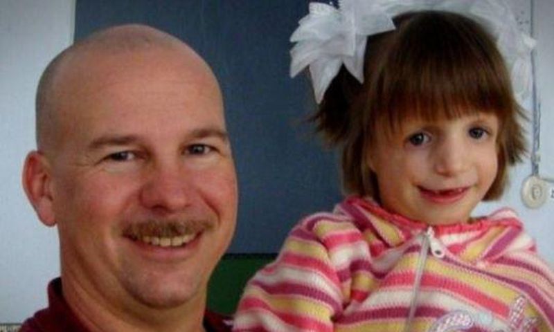Thom Wetmore and one of his daughters