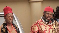 Zulu Adigwe and Pete Edochie on the set of Forbidden Land