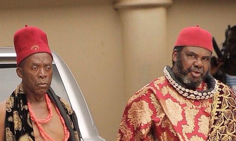Zulu Adigwe and Pete Edochie on the set of Forbidden Land