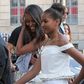 Sasha and Malia hit Milan streets in style