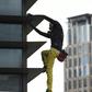 Alain Robert, dubbed the 'French spiderman' climbed the 47-storey GT Tower without safety equipment