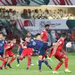 Japan skipper Maya Yoshida in acrobatic action on Sunday against Oman