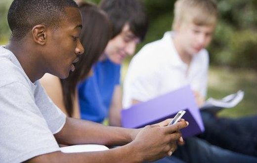 A student Playing with a phone