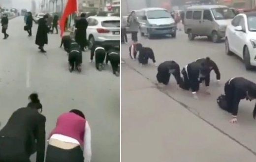 Company makes employees crawl through the streets for failing to meet sales targets (Video)