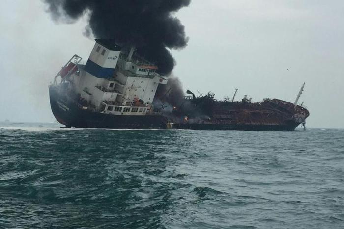 More than 20 people have been resecued and one has died after an oil tanker caught fire just off Hong Kong