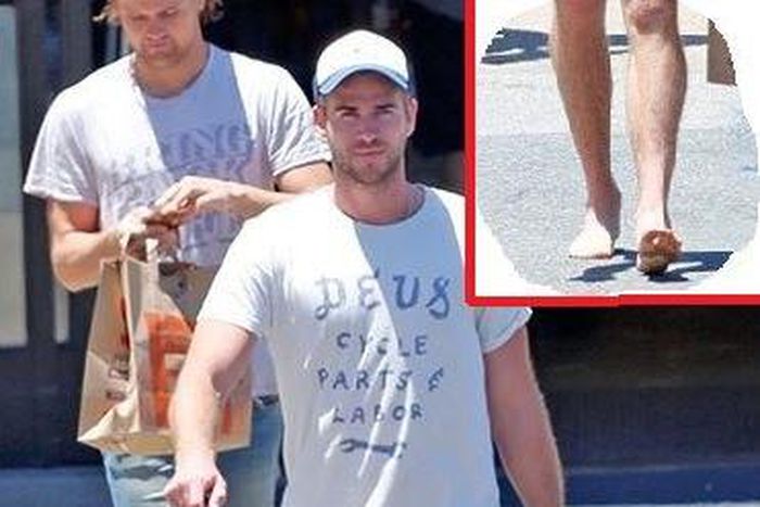 Liam Hemsworth goes barefoot in Malibu