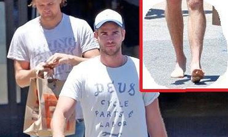 Liam Hemsworth goes barefoot in Malibu