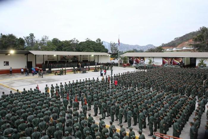 Members of the Bolivarian National Armed Forces (FANB) listen to Venezuela's President Nicolas Maduro during a military rally in Caracas, where Maduro hit out at "mercenaries" conspiring to sow division in the armed forces