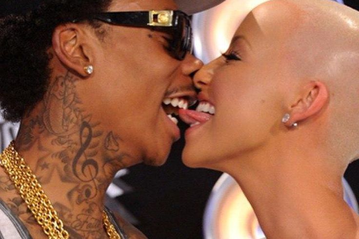 Amber Rose and Wiz Khalifa enjoy a passionate moment together