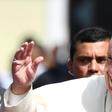 Pope Francis waves after a meeting with Central American bishops in which he blasted "fears and suspicions" over migration