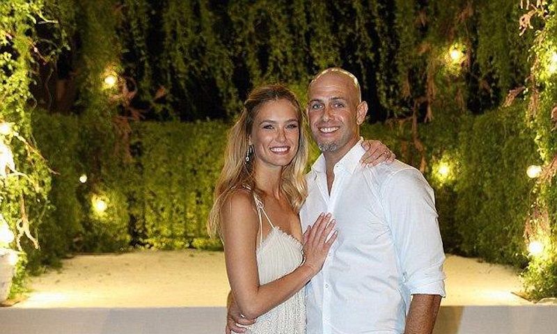 Bar Refaeli gave fans a glimpse of her big day by sharing an official photo of her posing with new husband right after tying the knot