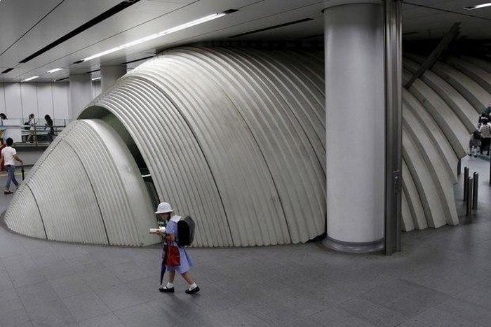 A schoolgirl walks through a Tokyo subway station. (Toru Hanai / Reuters)