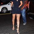 Pop singer, Rihanna, stepped out in thigh high strap heels