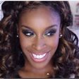 Jackie Aina wears a sultry makeup look
