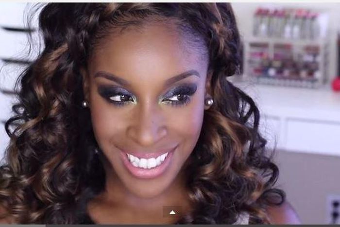 Jackie Aina wears a sultry makeup look