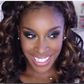 Jackie Aina wears a sultry makeup look