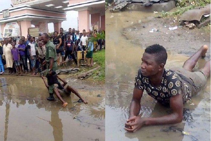 A Nigerian soldier brutalising a young man
