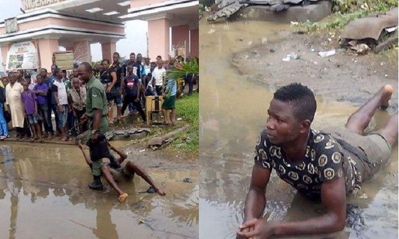 A Nigerian soldier brutalising a young man