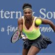 Serena Williams (USA) charges the net to return a shot against Tsventana Pironkova (not pictured) on day five during the Western and Southern Open tennis tournament at Linder Family Tennis Center. Mandatory Credit: Aaron Doster-USA TODAY Sports