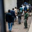 In unprecedented scenes, suspects have been hauled into court by the truckload, then denied bail and immediately put on trial in many cases -- some before they are given access to lawyers