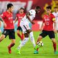 Anthony Modeste (C) in action for Tianjin Quanjian before the French striker walked out on the club last year due to unpaid salary and returned to former club Cologne
