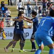 Yuya Osako is congratulated by Japanese teammates Yuto Nagatomo and Takumi Minamino after scoring in Wednesday's 3-2 win over Turkmenistan at the Asian Cup