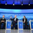 Coca-Cola CEO James Quincey (2L) and PepsiCO CEO Ramon Laguarta (R) participate in a panel discussion on reducing plastic waste during a session of the World Economic Forum in Davos, Switzerland