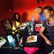 Nana Aba Anamoah in yellow, Benny Blanco and Ama K Abebrese having lunch